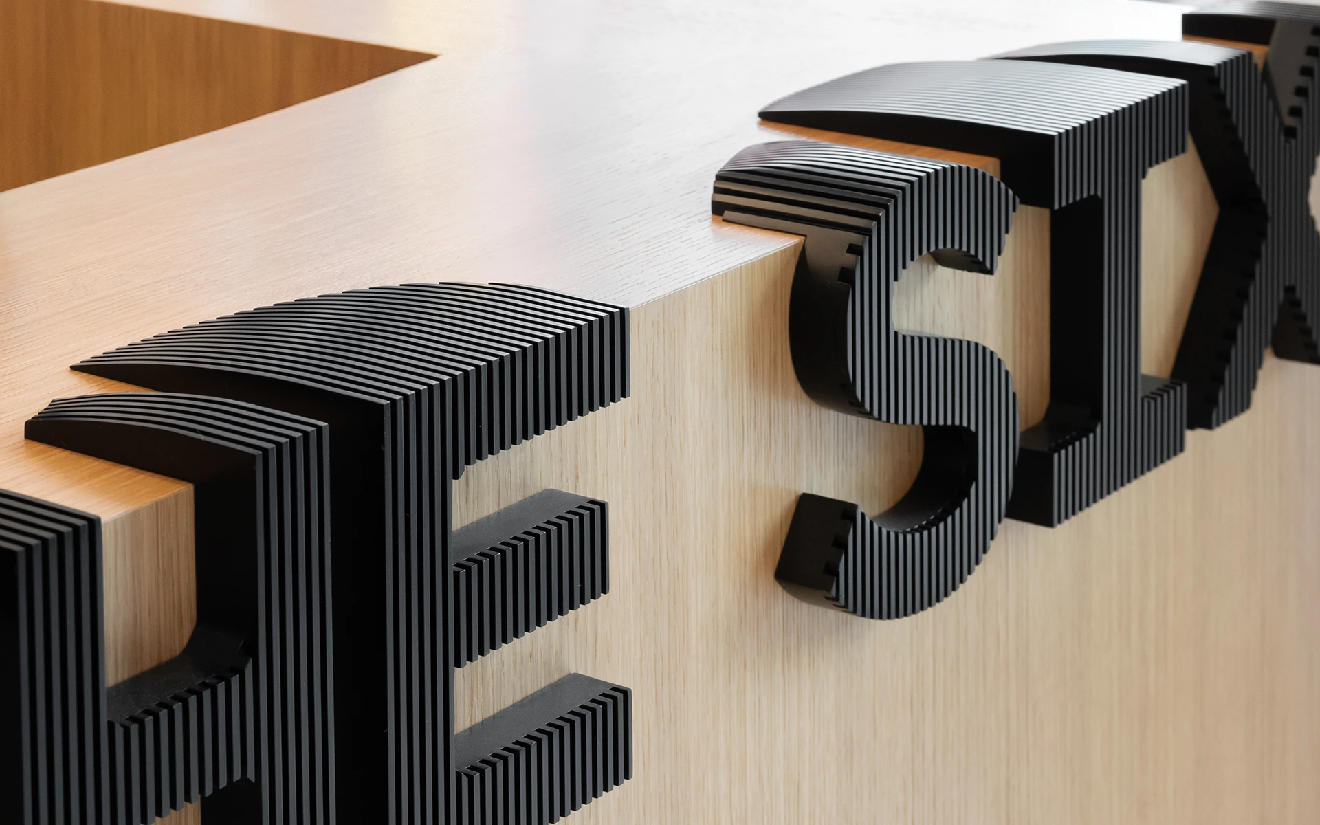 29_The Six_Reception Desk Logo